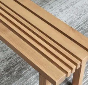 Solid wood bench — slatted seat detail, three-wide-three-narrow arrangement